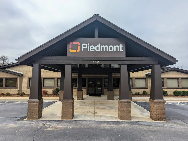 Piedmont Healthcare entrance with aluminum awning sign
